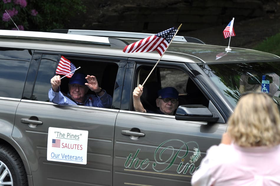 Residents at The Pines Senior Living traveling together in a car